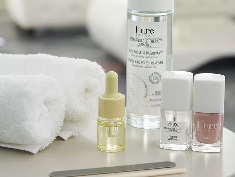 tratamientos Kure para manicure y esmalte rosado